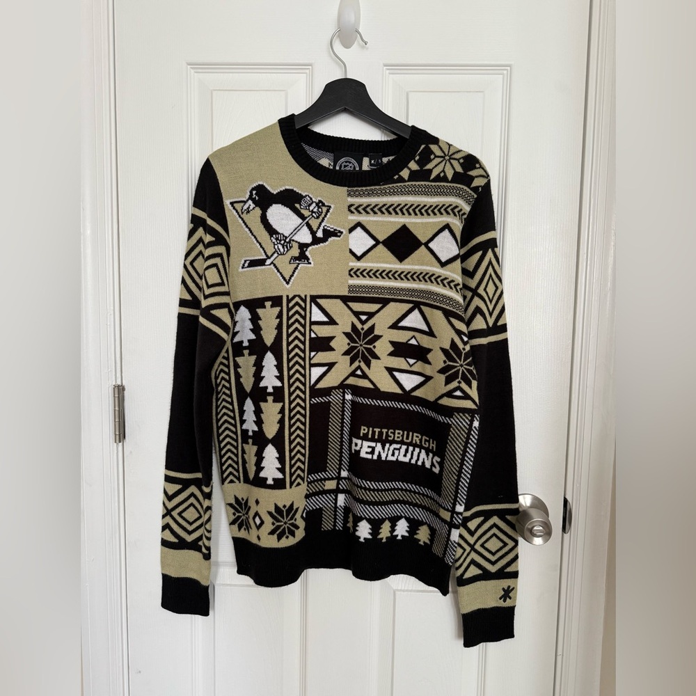 Officially licensed NHL Pittsburgh Penguins Hock ‘ugly’ sweater.